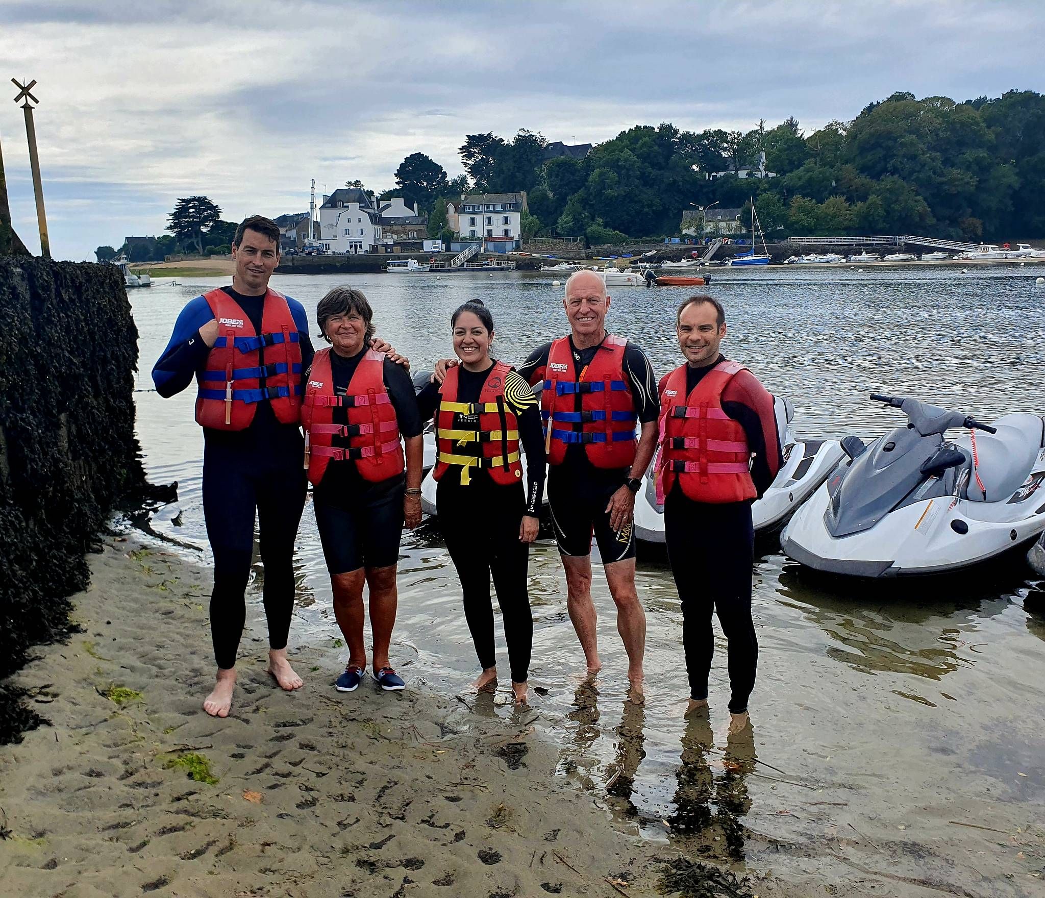 The Brittany LBI team in front of jet-skis
